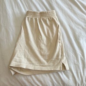 Brandy Melville cream sweatshorts.